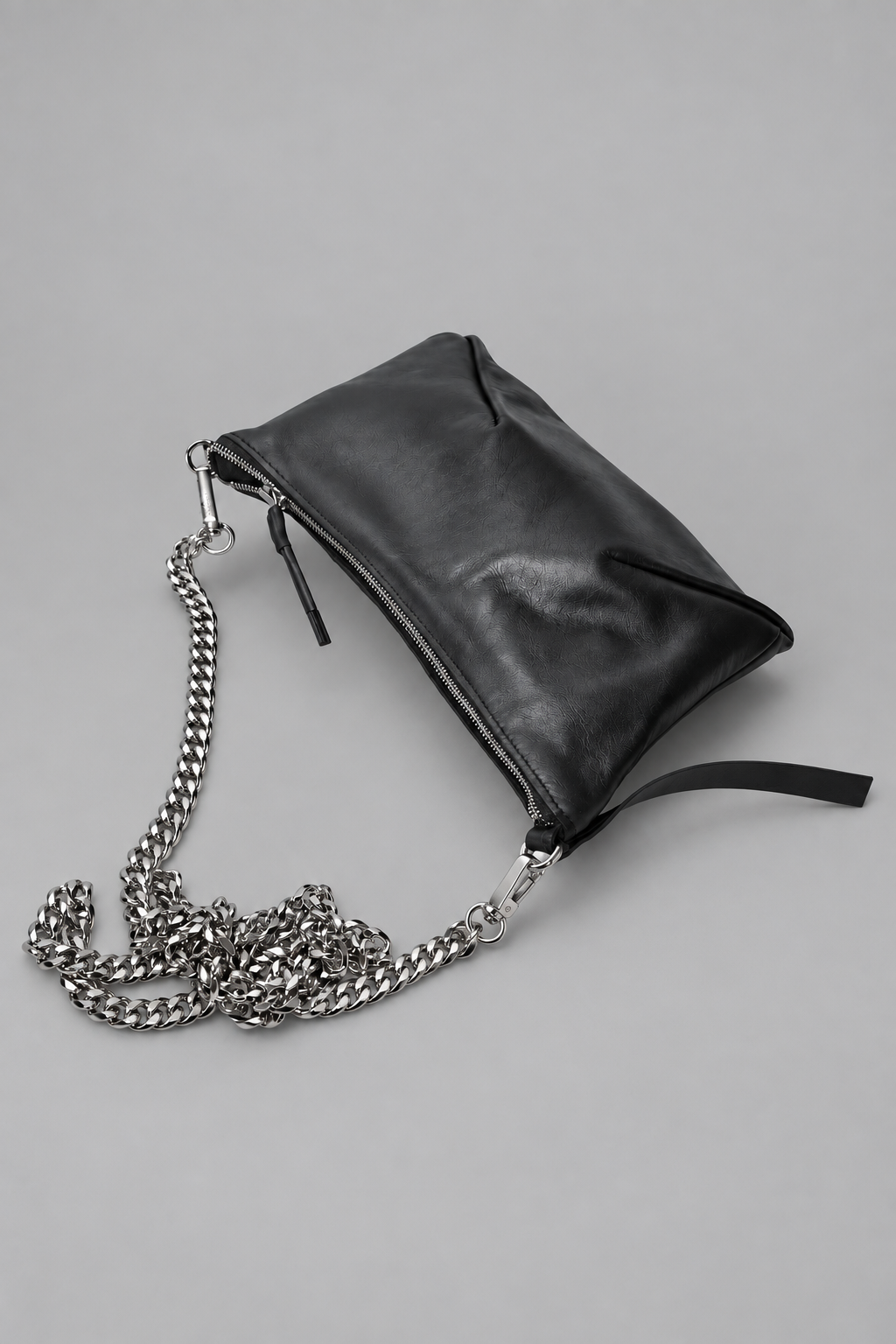 NUTSA NM9104 Leather Charm Pouch in black calf leather with detachable metal chain and zipper closure