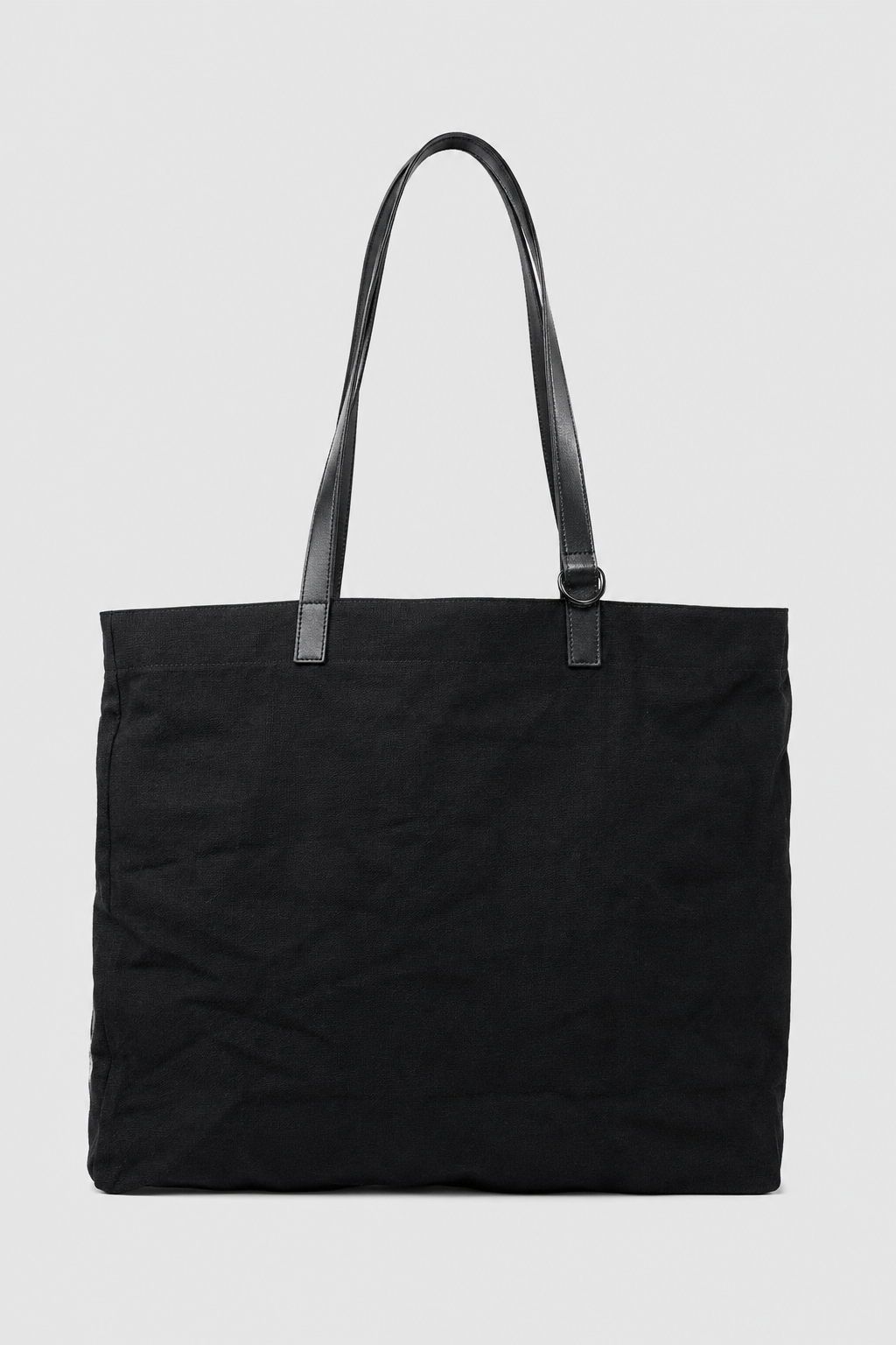 Tagliovivo Shopper Bag in Skylark with vintage fabric body, hand dyed leather pocket, and raw iron ring detail