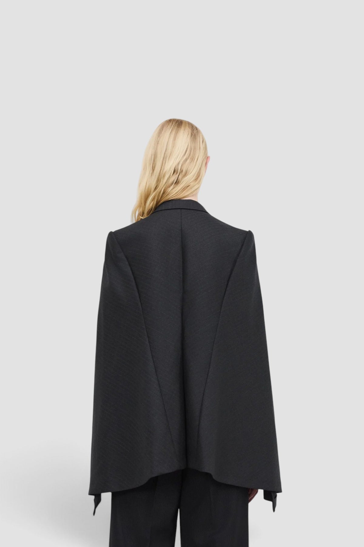 Women's Cut Out Sleeve Blazer in Charcoal Pin Stripe wool blend with tailored fit and asymmetric cut hem