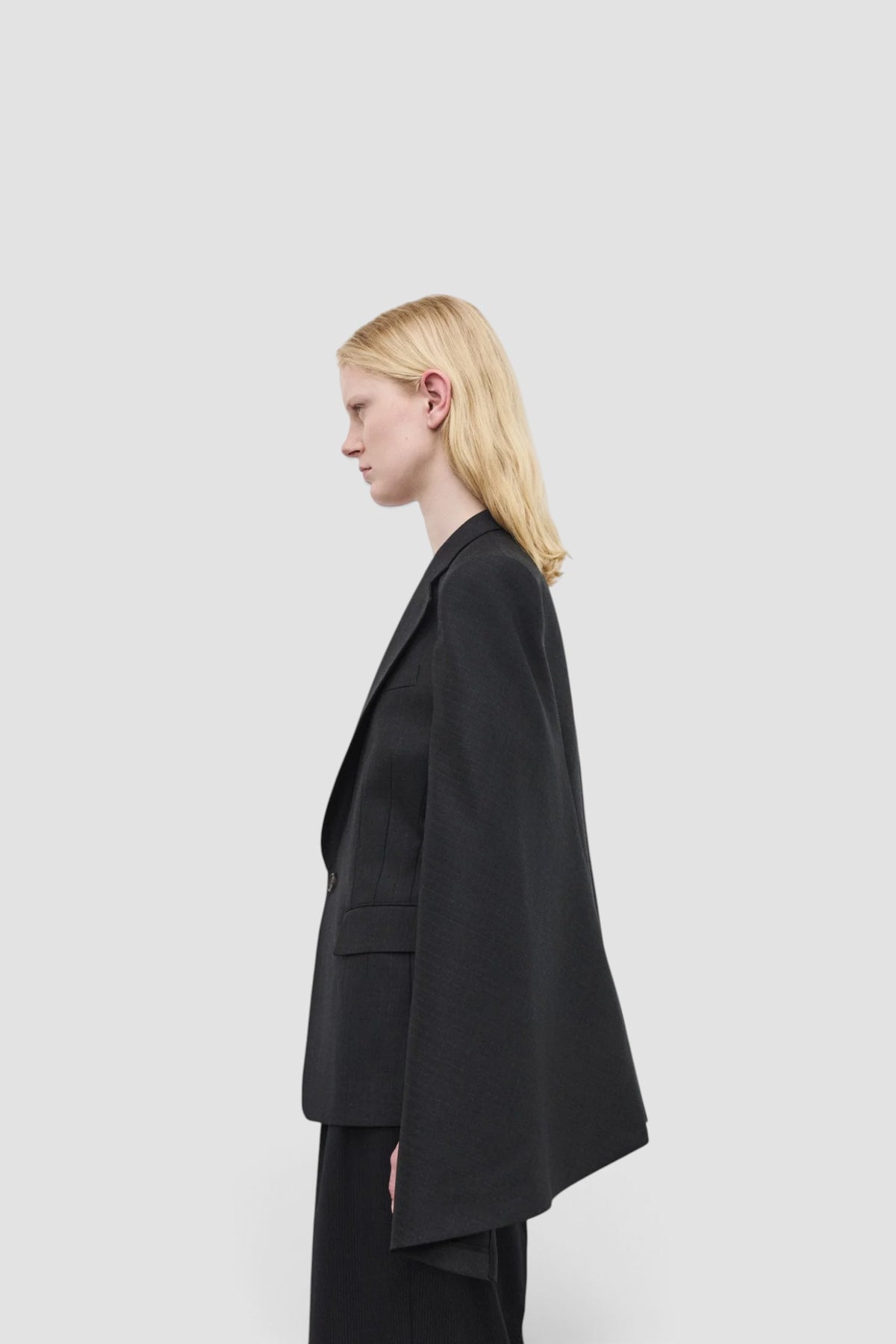 Women's Cut Out Sleeve Blazer in Charcoal Pin Stripe wool blend with tailored fit and asymmetric cut hem