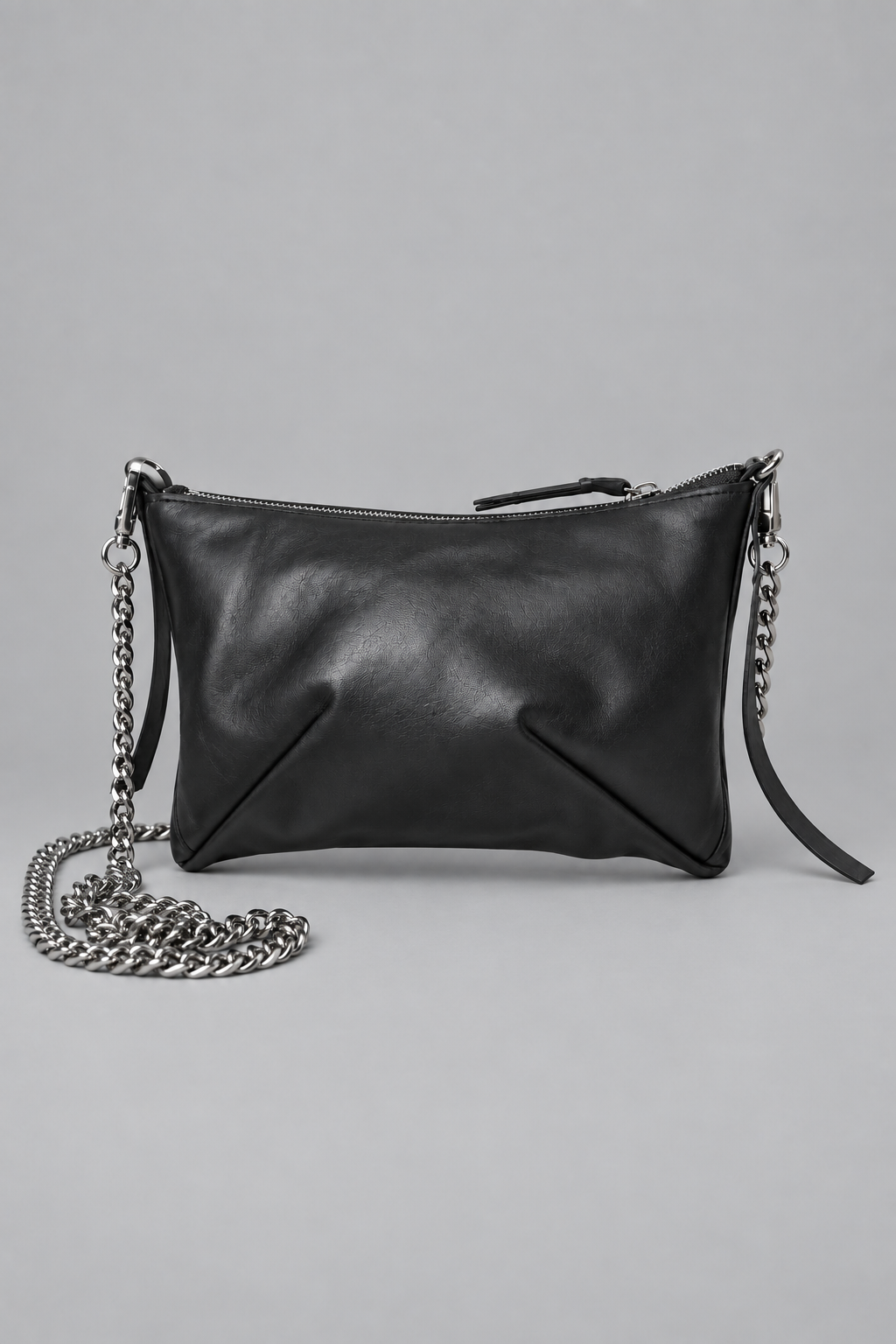 NUTSA NM9104 Leather Charm Pouch in black calf leather with detachable metal chain and zipper closure