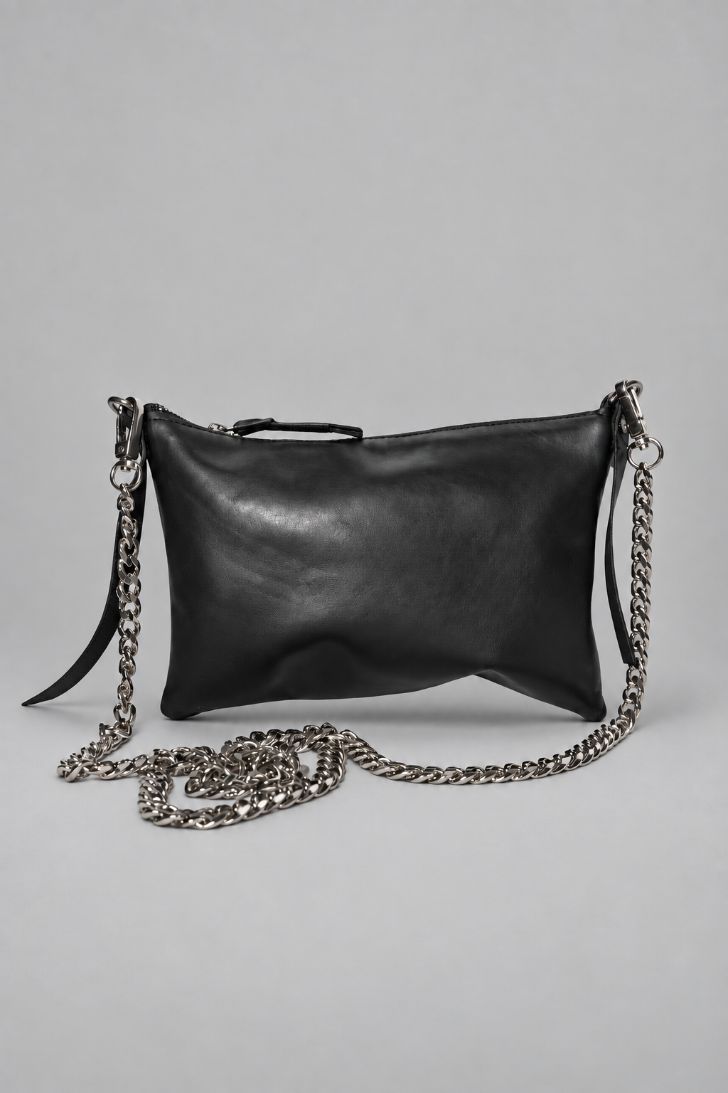 NUTSA NM9104 Leather Charm Pouch in black calf leather with detachable metal chain and zipper closure