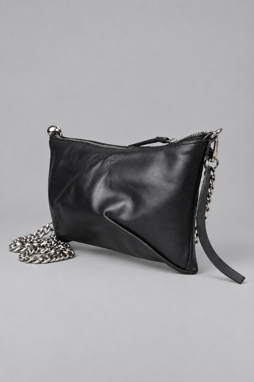 NUTSA NM9104 Leather Charm Pouch in black calf leather with detachable metal chain and zipper closure