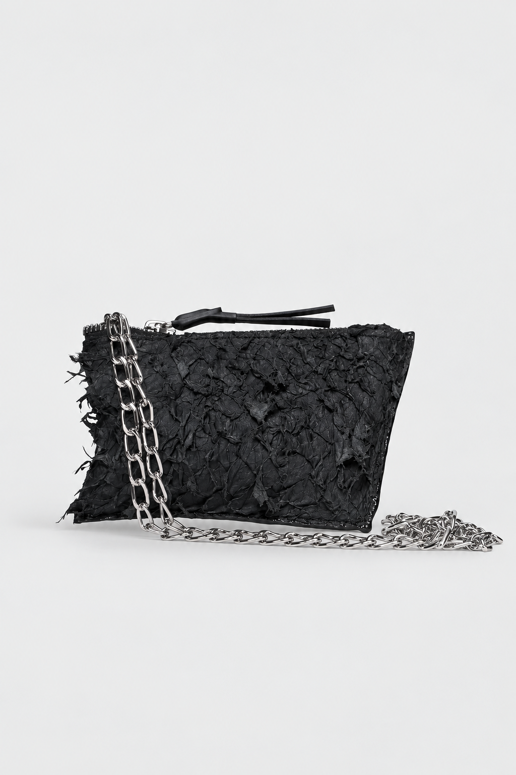 NUTSA NM9906 Leather Charm Pouch in black barracuda leather with detachable metal chain and YKK zipper closure