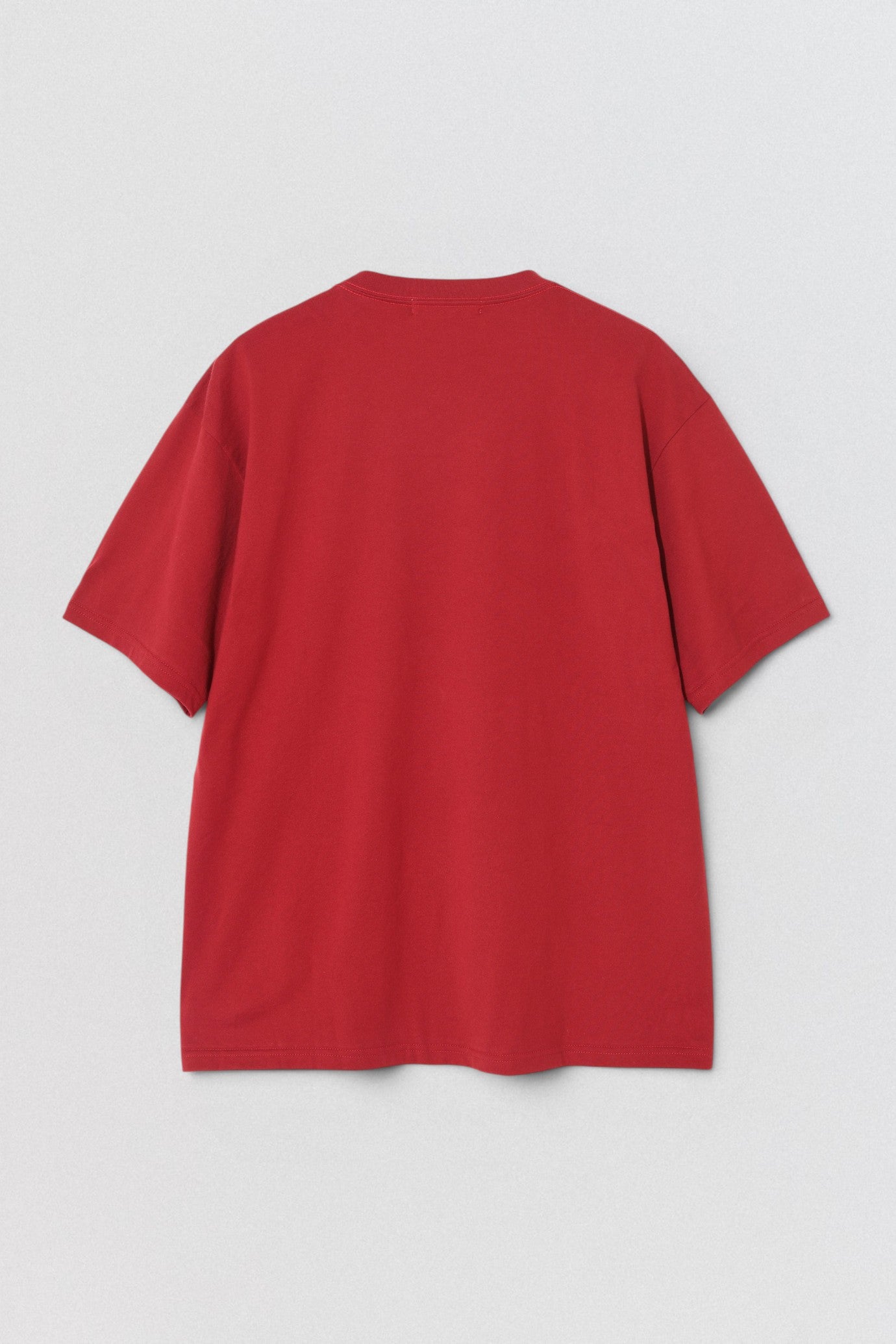 Undercover SS26 Bike Man T-Shirt  Red t-shirt on a light gray background