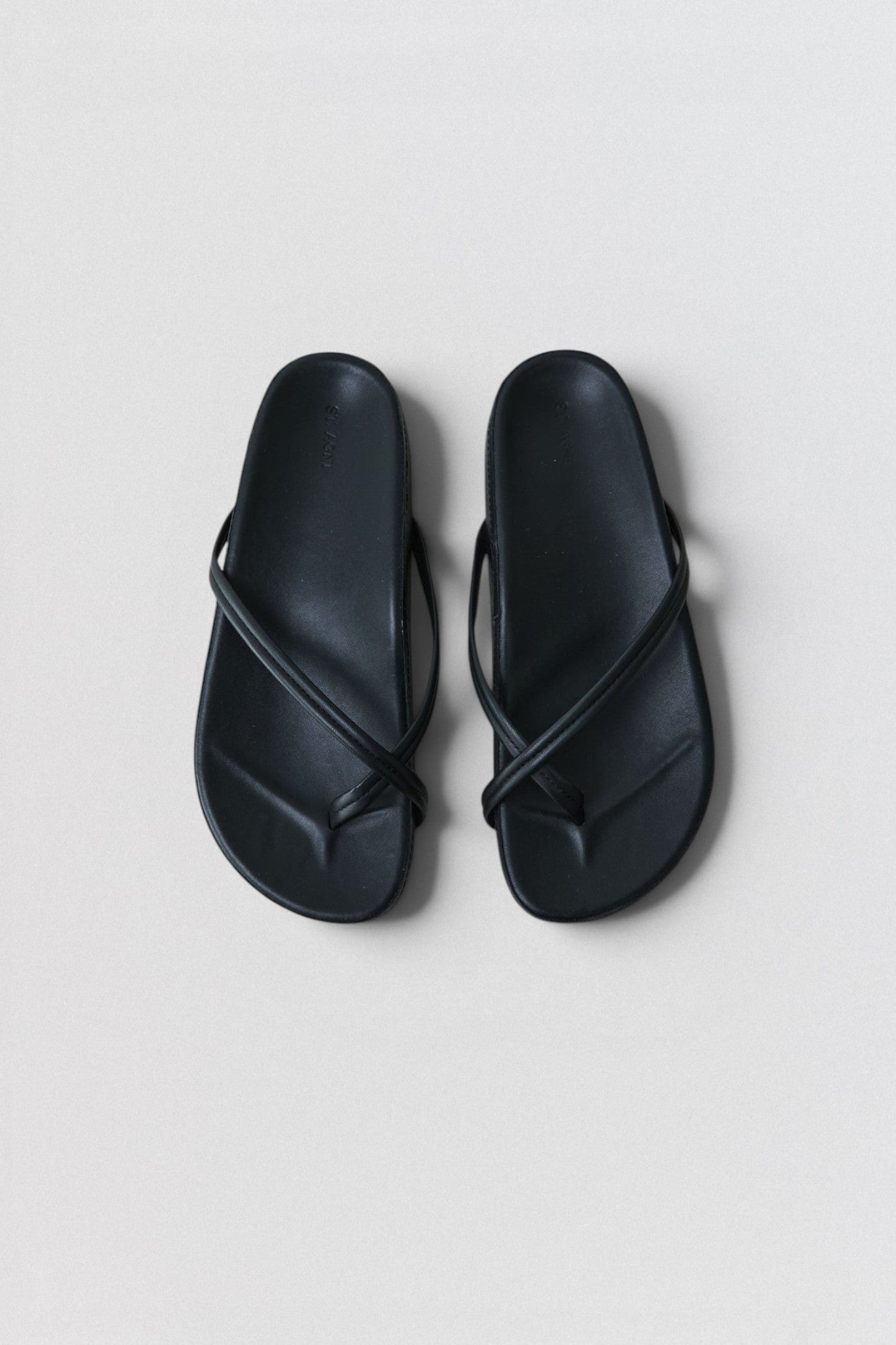 ST. AGNI Cross Strap Flatform in black with lambskin crossover straps and chunky flatform sole
