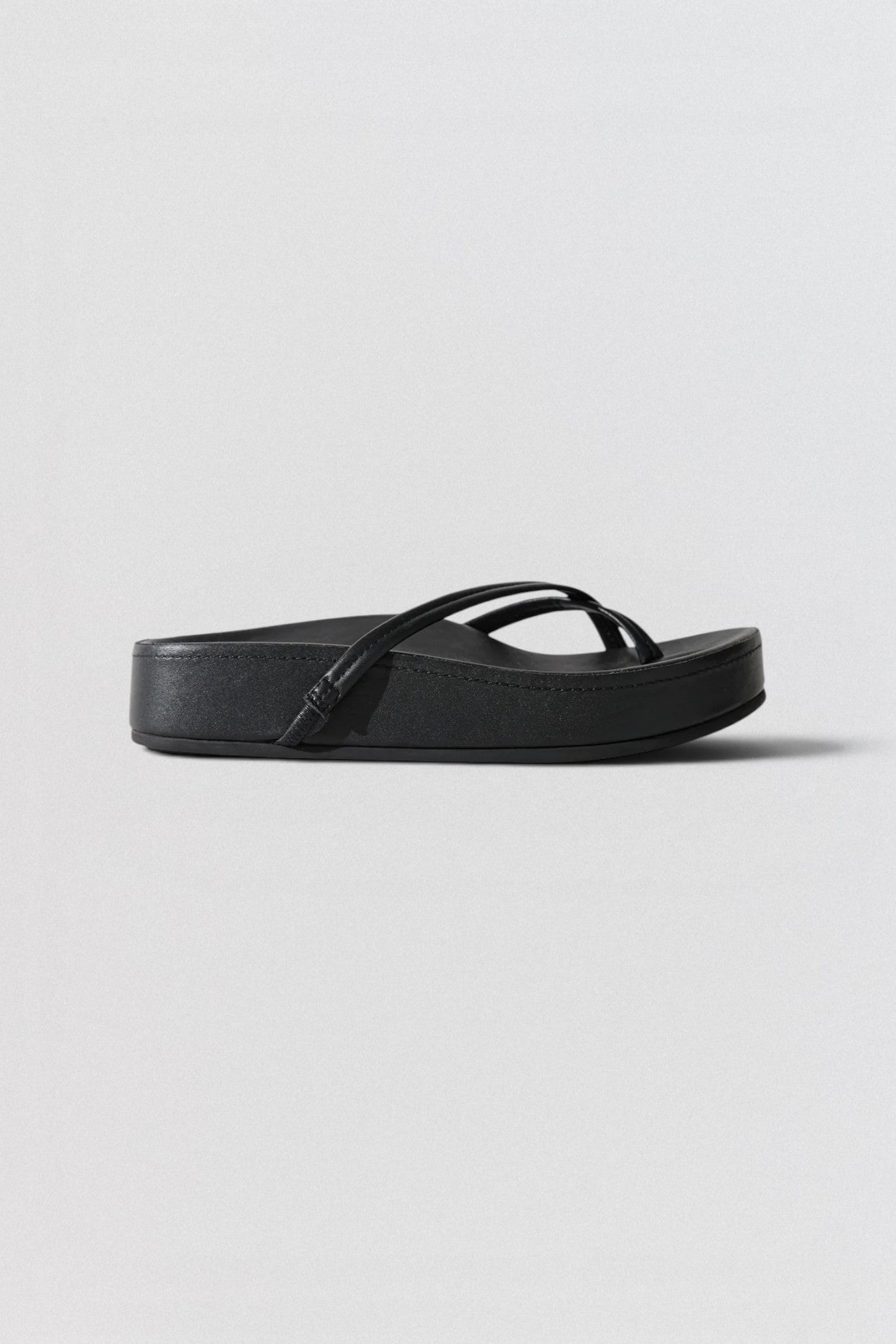 ST. AGNI Cross Strap Flatform in black with lambskin crossover straps and chunky flatform sole