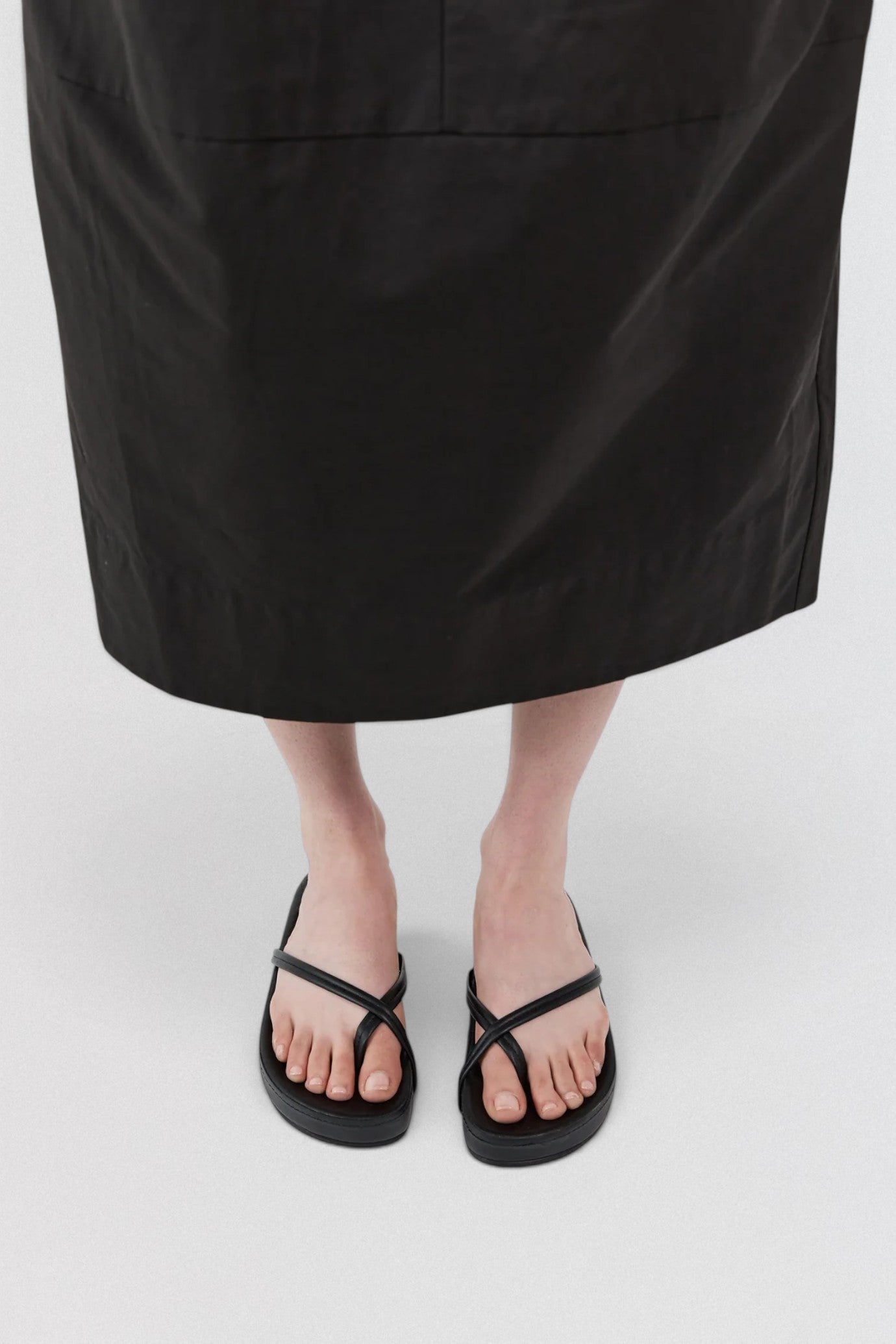 ST. AGNI Cross Strap Flatform in black with lambskin crossover straps and chunky flatform sole
