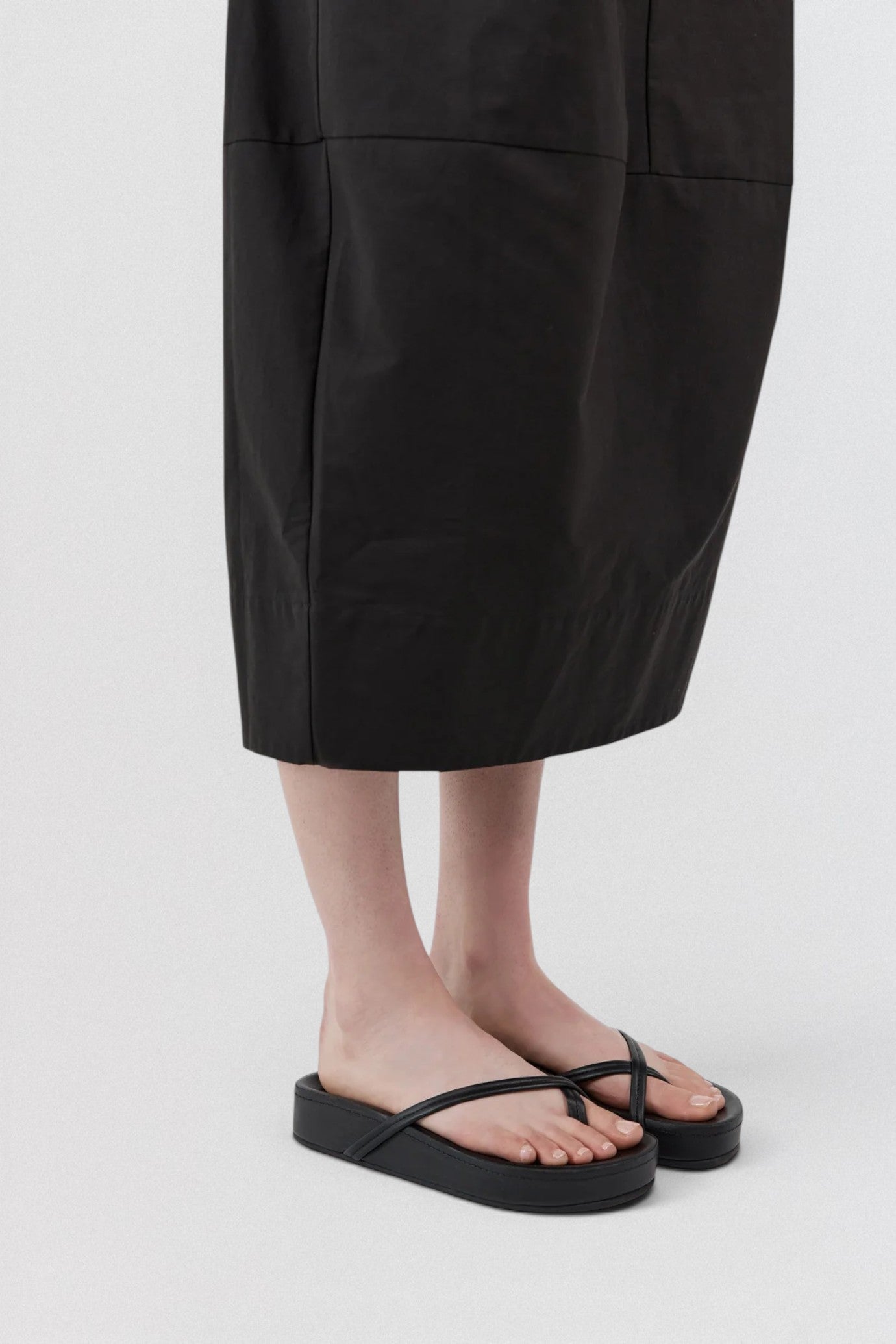 ST. AGNI Cross Strap Flatform in black with lambskin crossover straps and chunky flatform sole