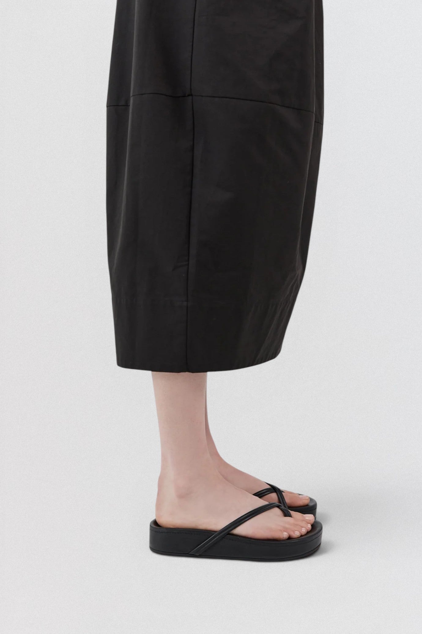 ST. AGNI Cross Strap Flatform in black with lambskin crossover straps and chunky flatform sole