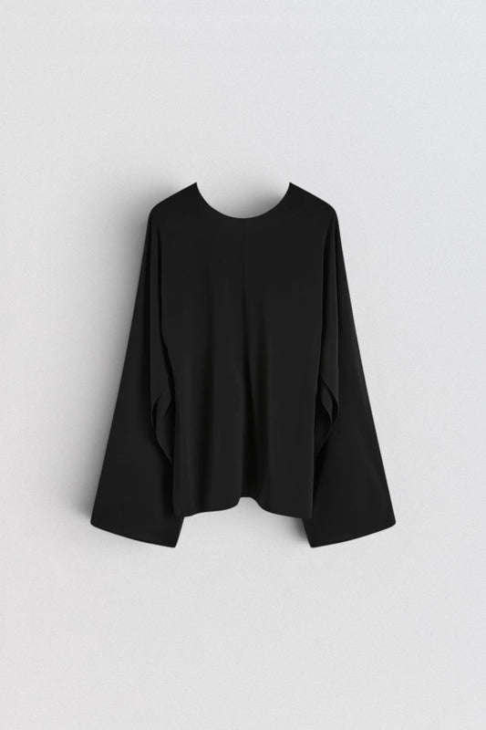 ST. AGNI Hybrid Top in black with multi-wear extended sleeves and fluid viscose construction