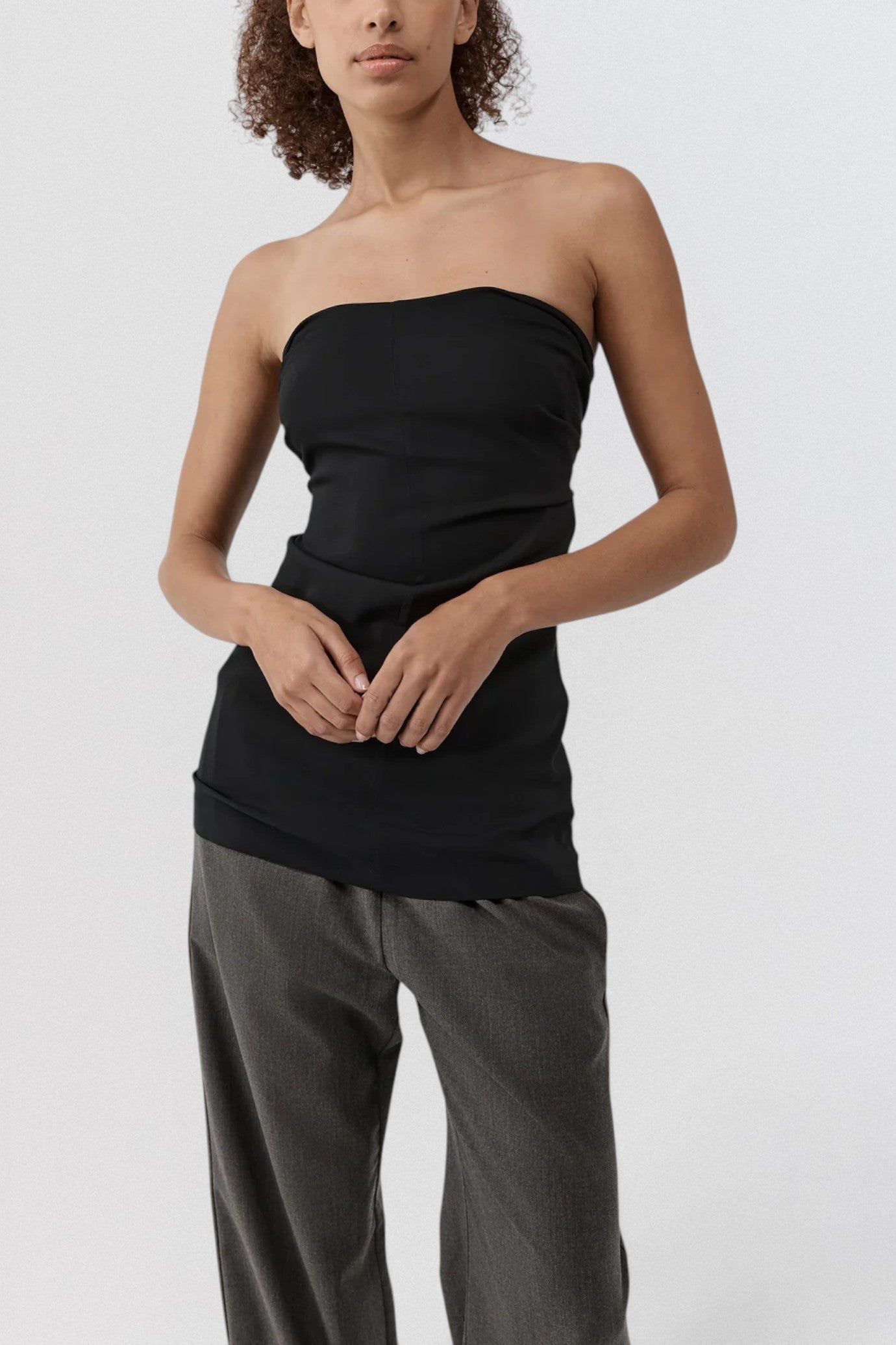 ST. AGNI Hybrid Top in black with multi-wear extended sleeves and fluid viscose construction