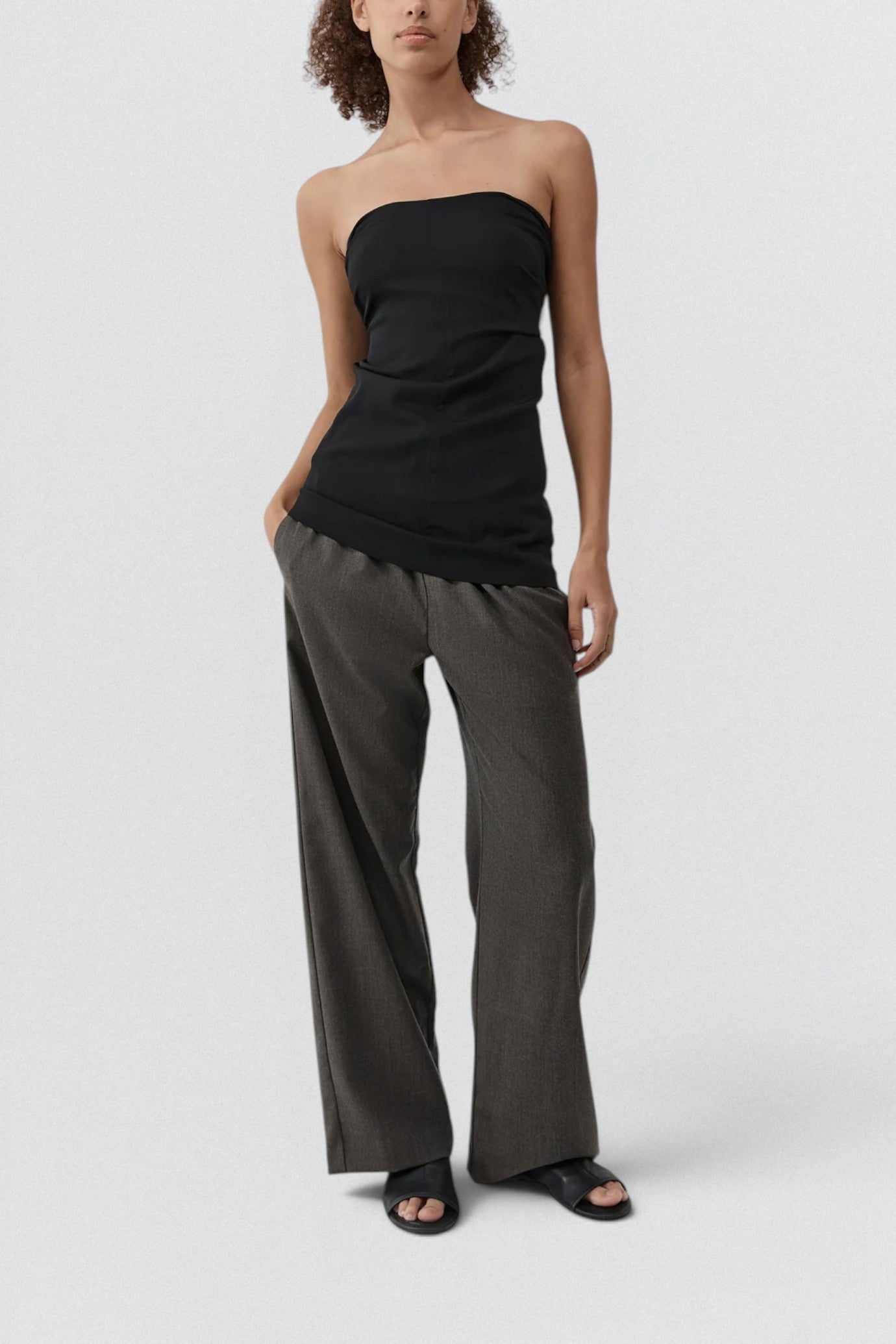ST. AGNI Hybrid Top in black with multi-wear extended sleeves and fluid viscose construction