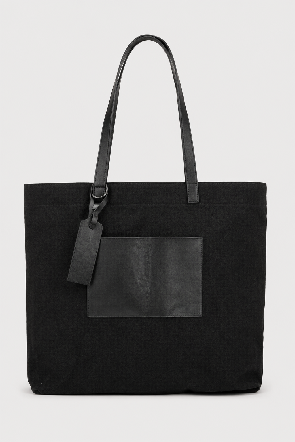 Tagliovivo Shopper Bag in Skylark with vintage fabric body, hand dyed leather pocket, and raw iron ring detail
