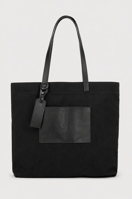 Tagliovivo Shopper Bag in Skylark with vintage fabric body, hand dyed leather pocket, and raw iron ring detail