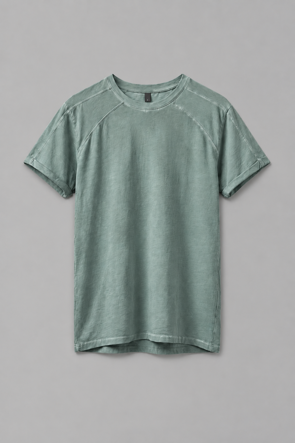 Shop the DESU Tony T Shirt in Dirty Turquoise at LABOUTIK Bali. A Supima cotton t shirt with relaxed fit, low cut shoulders, roll up sleeves, and pigment based cold dye finish.