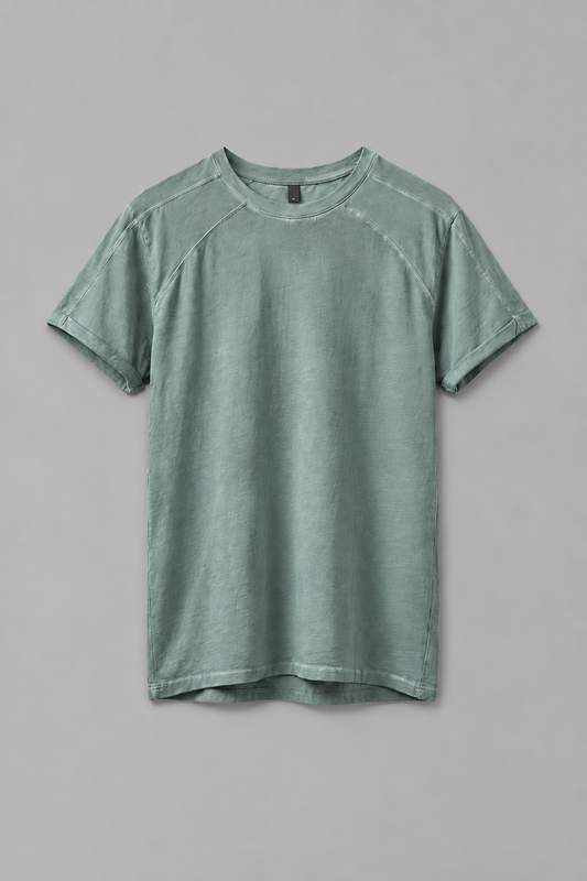 Shop the DESU Tony T Shirt in Dirty Turquoise at LABOUTIK Bali. A Supima cotton t shirt with relaxed fit, low cut shoulders, roll up sleeves, and pigment based cold dye finish.